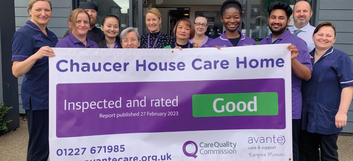 Staff at Chaucer House holding up a CQC Good Rating Banner