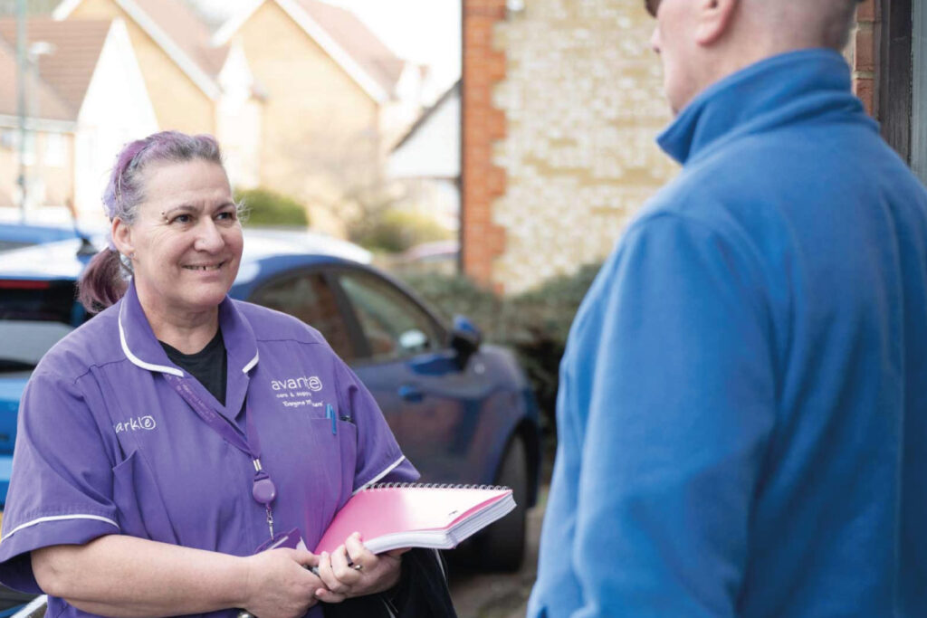 Home Carer talking with a service user