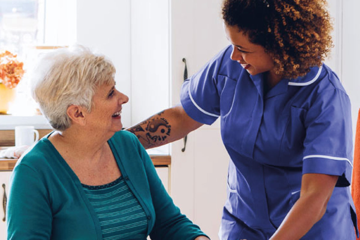 Avante Carer talking with a resident
