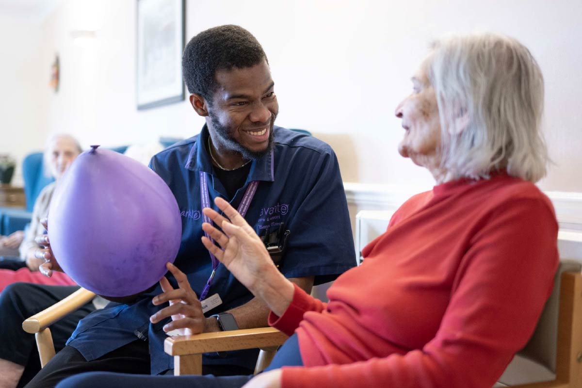 Avante Carer talking and smiling with a resident