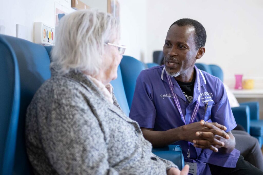 Avante Care and Resident sitting down and talking