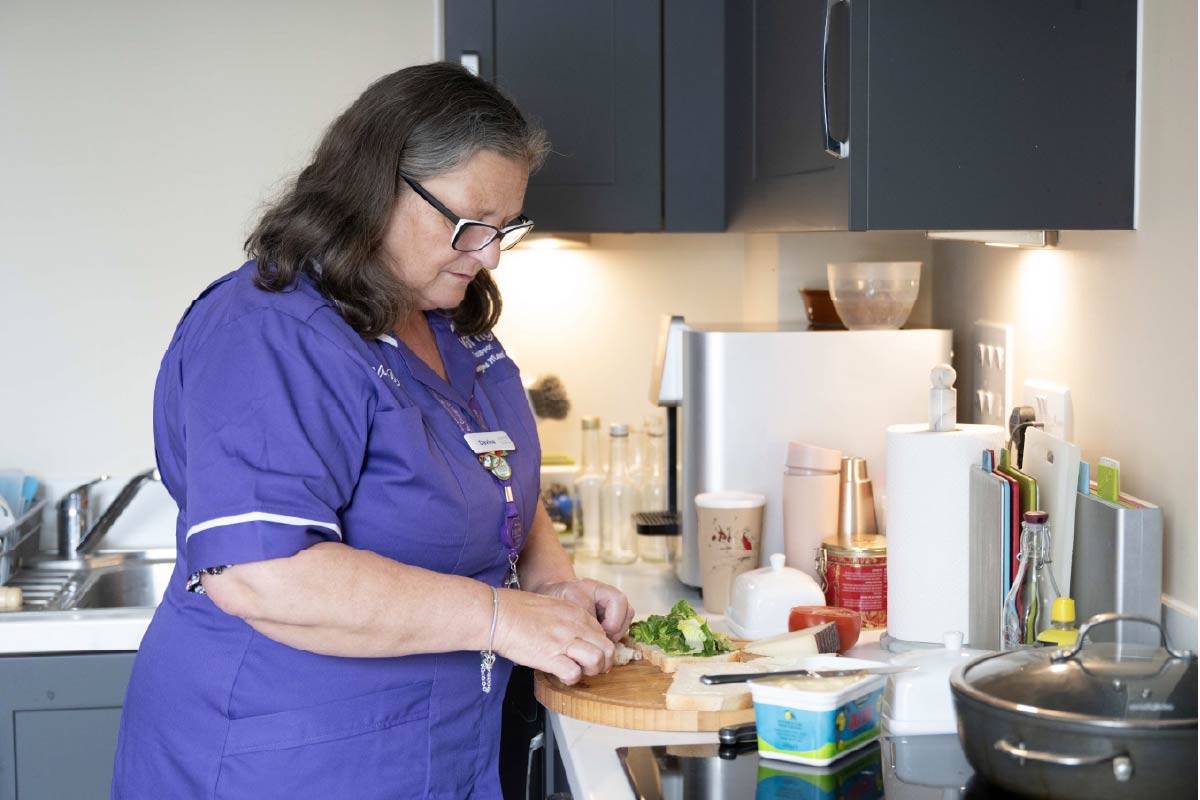 A Home Carer supporting a service user